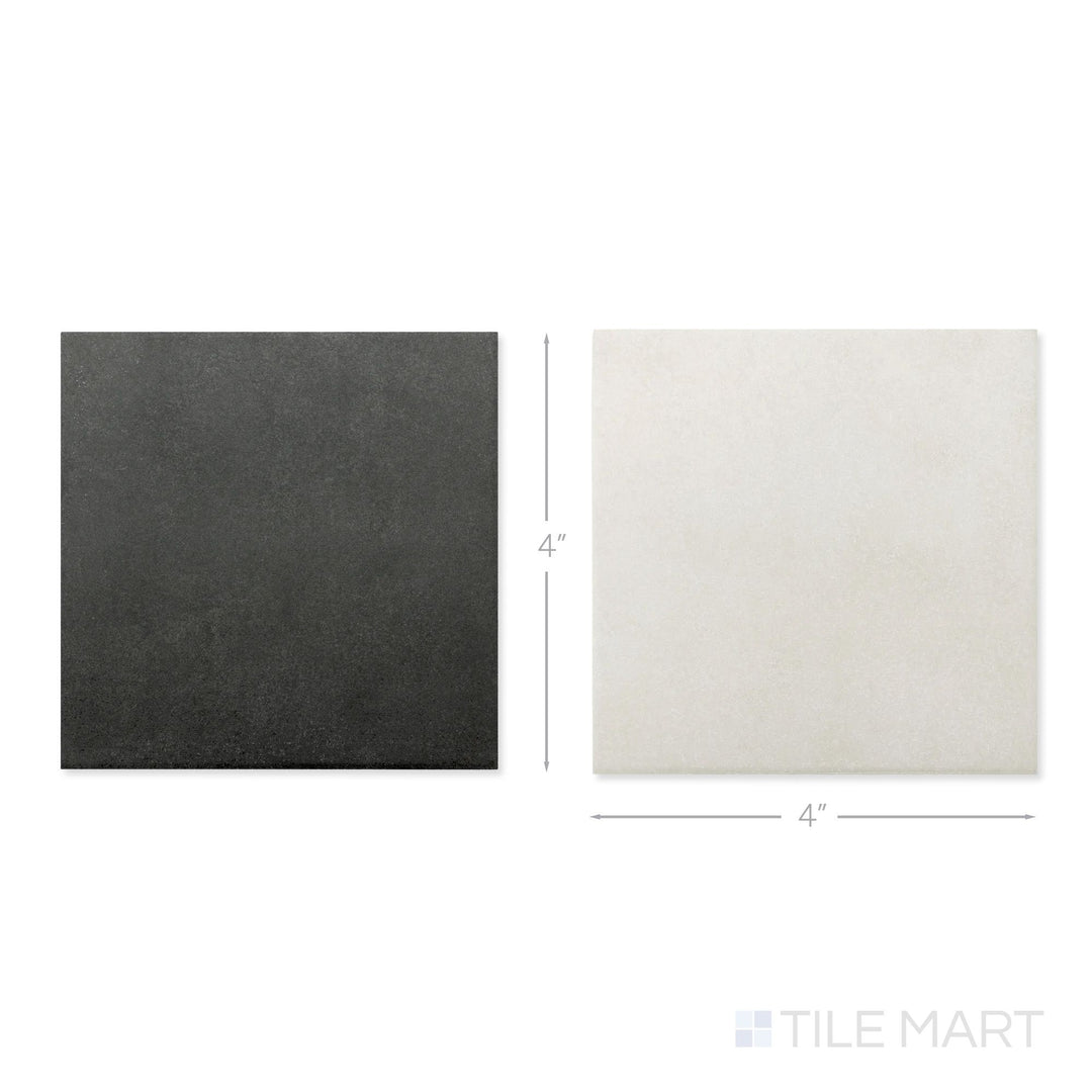 Top-down view of a single Stage 4x4 white and charcoal checkerboard matte porcelain tile showing its crisp two-tone surface and matte finish detail