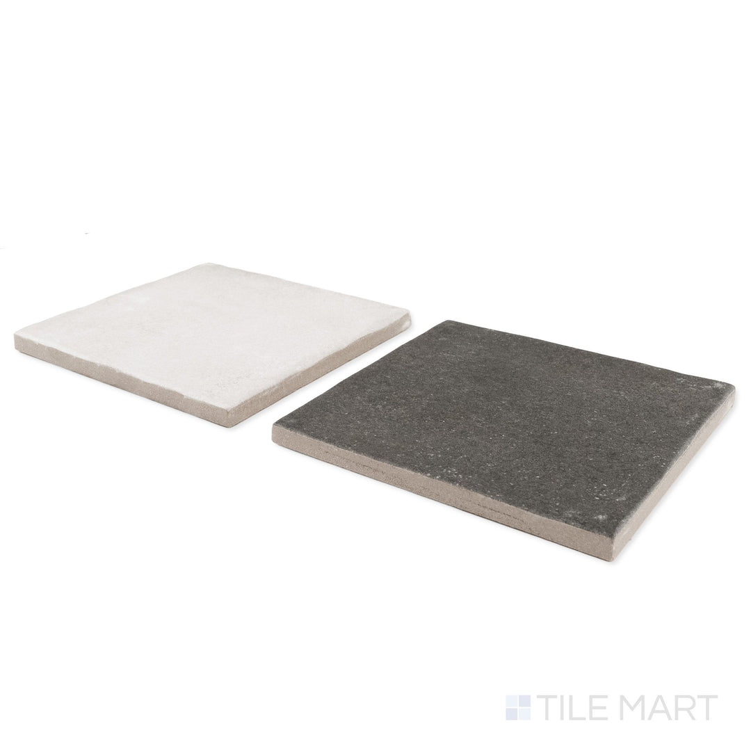 Corner shot of Stage 4x4 white and charcoal checkerboard matte porcelain tile revealing its edge profile and bold contrasting matte surface