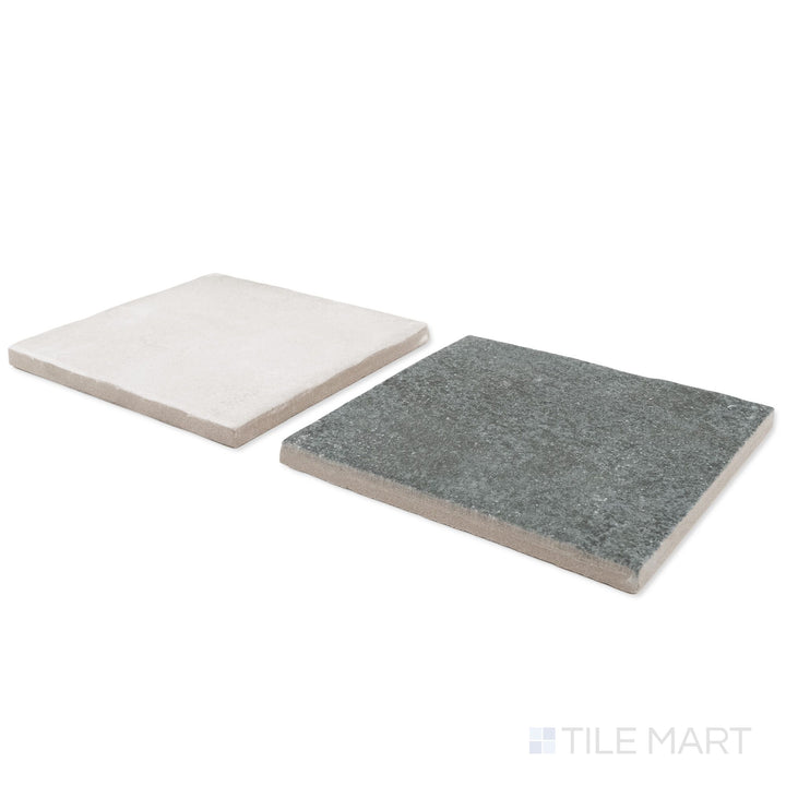 Corner shot of Stage 4x4 white and denim checkerboard matte porcelain tile revealing its edge profile and cool denim-toned matte surface