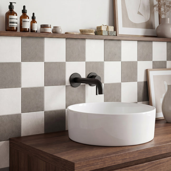 White and grey 4x4 matte porcelain checkerboard tile reflecting a clean, understated look with timeless neutral appeal