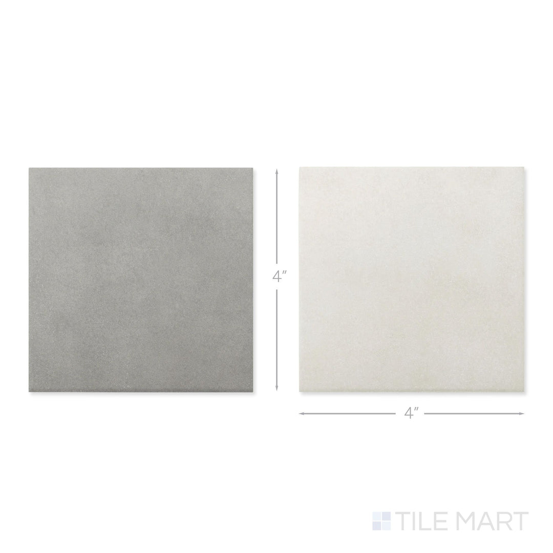 Top-down view of a single Stage 4x4 white and grey checkerboard matte porcelain tile showing its understated two-tone surface and clean matte finish detail