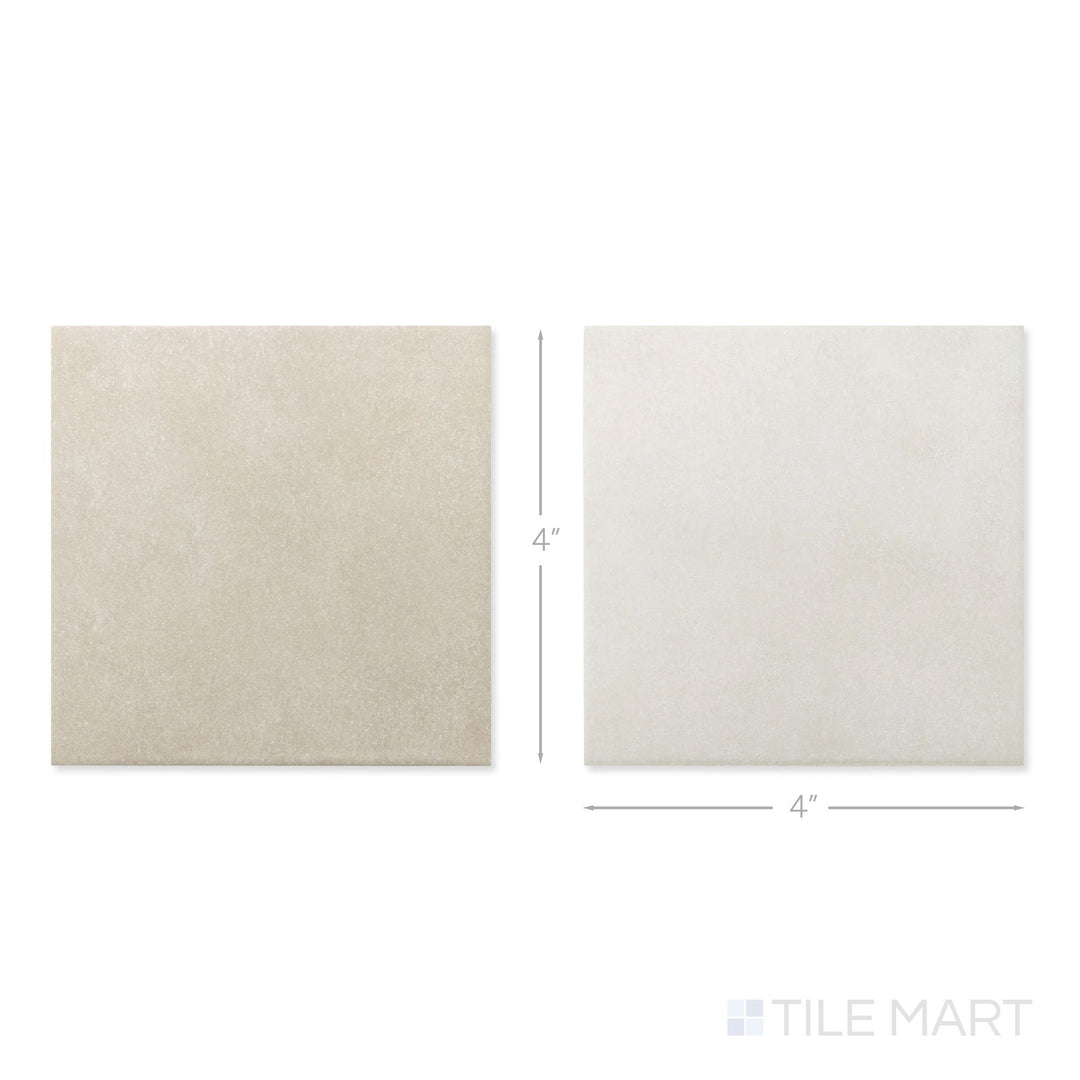 Top-down view of a single Stage 4x4 white and taupe checkerboard matte porcelain tile showing its warm two-tone surface and understated matte finish detail