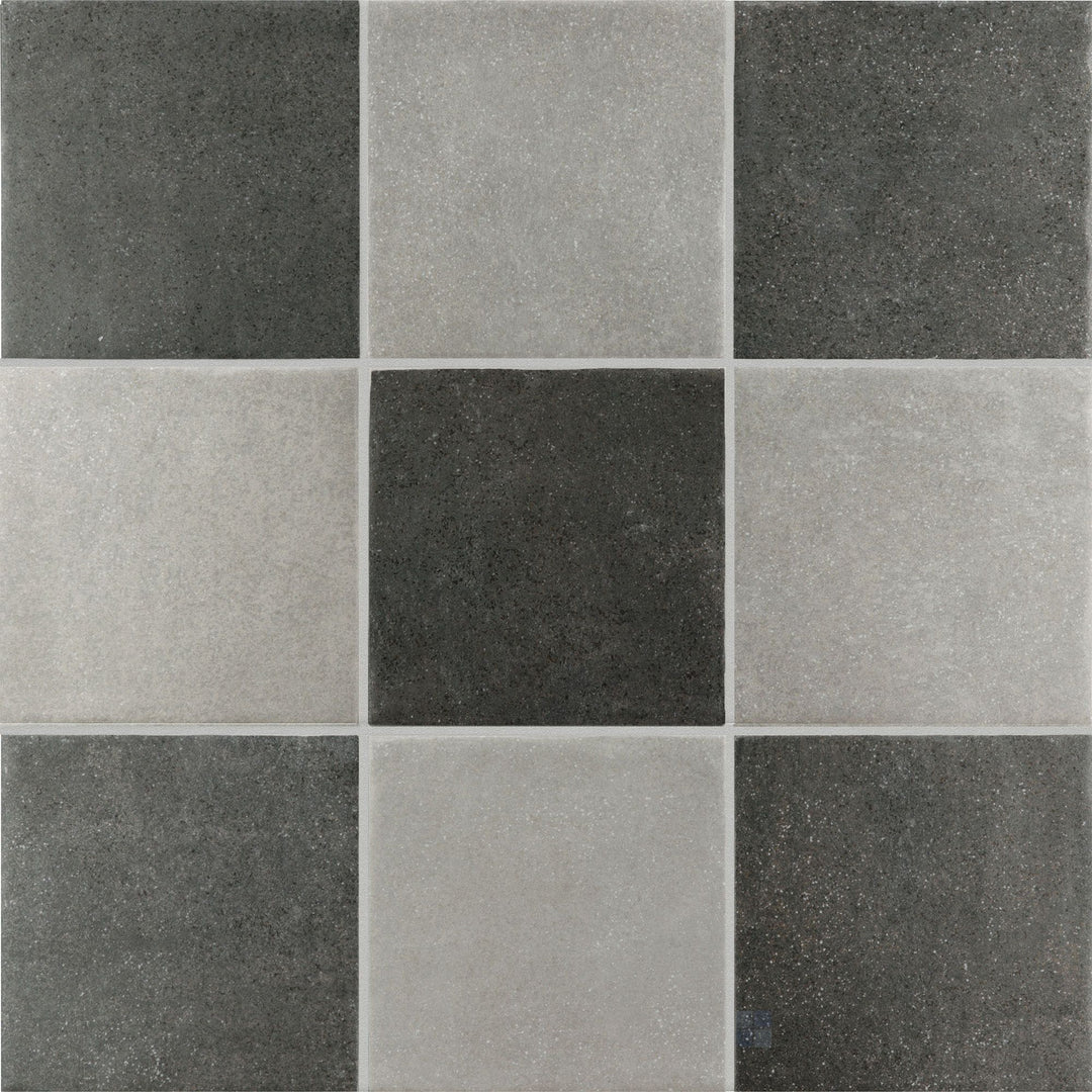 Subtle tone-on-tone checkerboard matte porcelain tile in layered grey and charcoal 4x4 squares