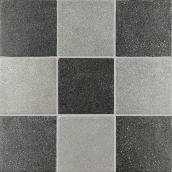 Subtle tone-on-tone checkerboard matte porcelain tile in layered grey and charcoal 4x4 squares