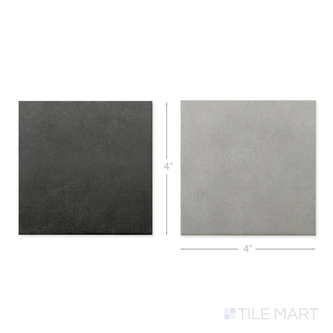 Top-down view of a single Stage 4x4 grey and charcoal checkerboard matte porcelain tile showing its layered cool-toned surface and matte finish detail