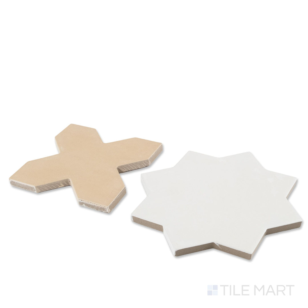 Corner shot of Kasbah fawn cross and bone star checkerboard matte porcelain tile revealing its edge profile and warm neutral geometric matte surface