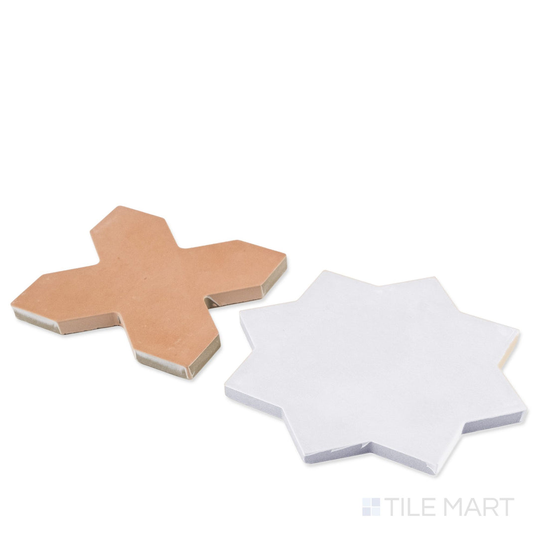 Corner shot of Kasbah terracotta cross and bone star checkerboard matte porcelain tile revealing its edge profile and rich earthy geometric matte surface