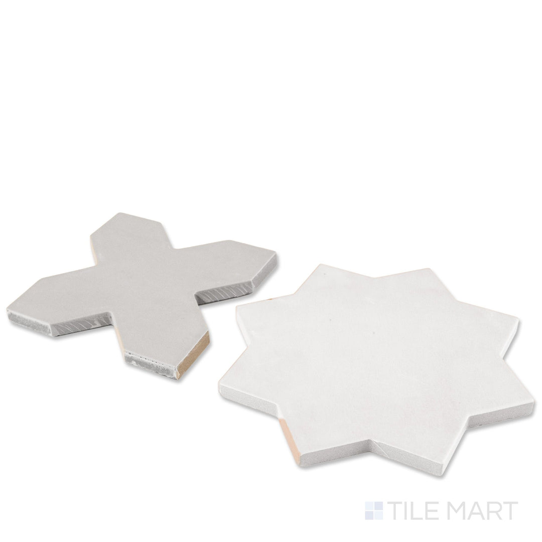 Corner shot of Kasbah smoke cross and bone star checkerboard matte porcelain tile revealing its edge profile and cool understated geometric matte surface