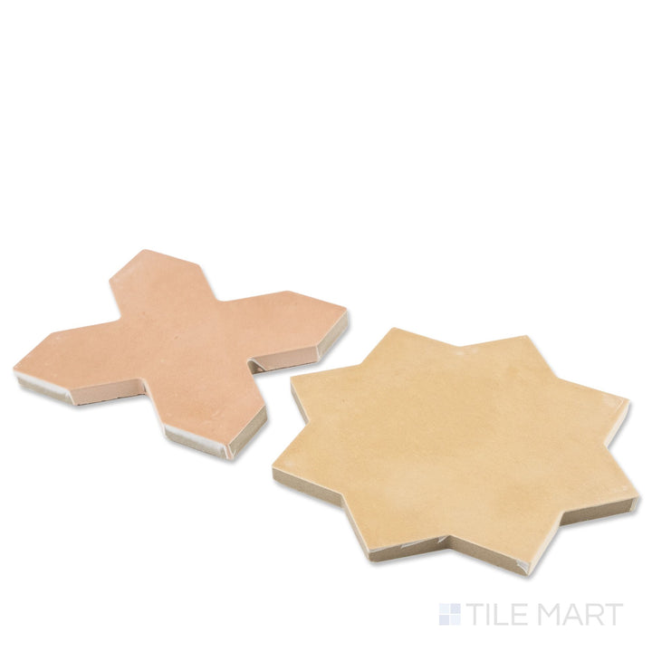Corner shot of Kasbah terracotta cross and fawn star checkerboard matte porcelain tile revealing its edge profile and rich warm earthy geometric matte surface