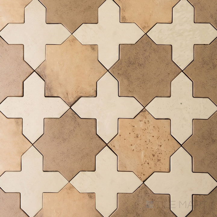 Overview of Amalfi 7x7 tile in bone cross and mud star checkerboard matte porcelain tile from an alternate angle highlighting its tile in bone and mud color contrast