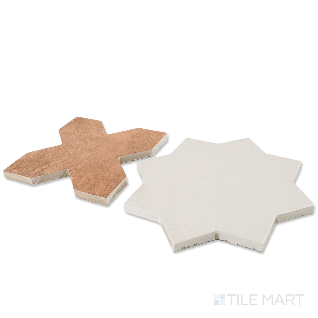 Corner shot of Amalfi 7x7 tile in terracotta cross and bone star checkerboard matte porcelain tile revealing its edge profile and two-piece geometric matte surface
