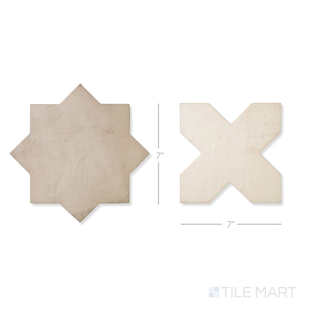 Top-down view of a single Amalfi 7x7 tile in bone cross and gray star checkerboard matte porcelain tile showing its interlocking geometric surface and matte finish detail