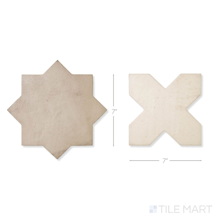 Top-down view of a single Amalfi 7x7 tile in bone cross and gray star checkerboard matte porcelain tile showing its interlocking geometric surface and matte finish detail