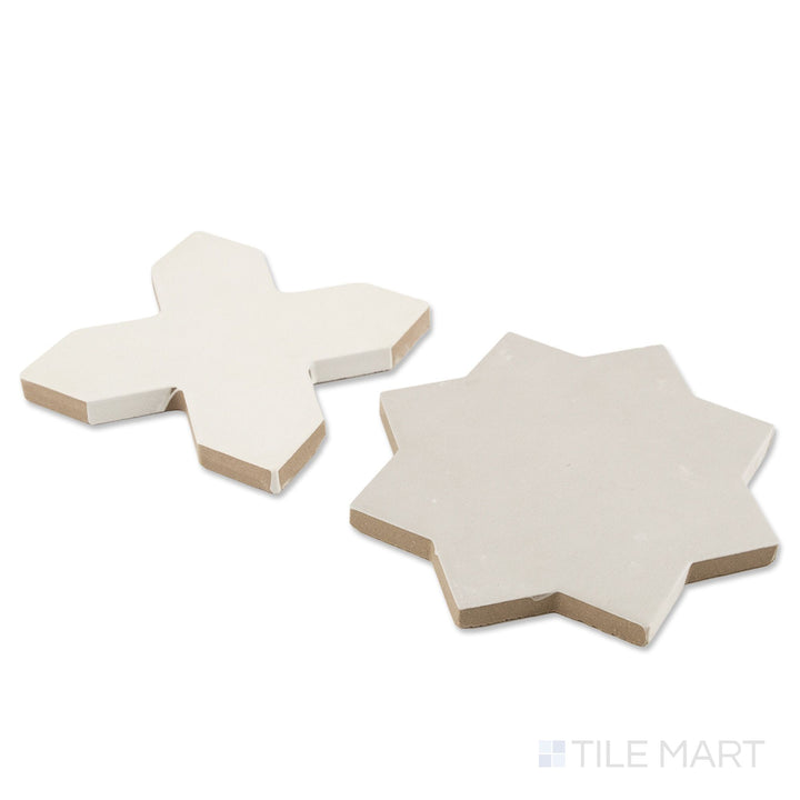 Corner shot of Amalfi 7x7 tile in bone cross and gray star checkerboard matte porcelain tile revealing its edge profile and two-piece geometric matte surface