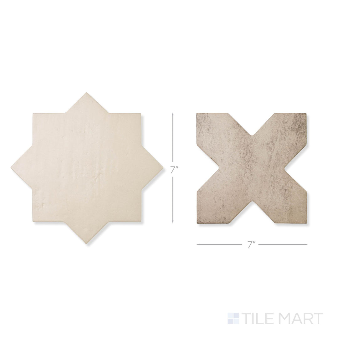 Top-down view of a single Amalfi 7x7 tile in gray cross and bone star checkerboard matte porcelain tile showing its interlocking geometric surface and matte finish detail