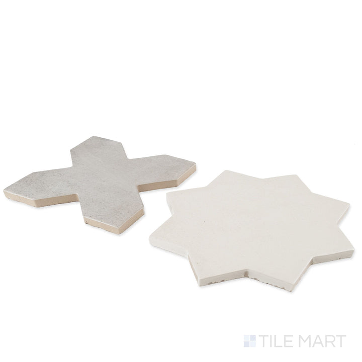 Corner shot of Amalfi 7x7 tile in gray cross and bone star checkerboard matte porcelain tile revealing its edge profile and two-piece geometric matte surface