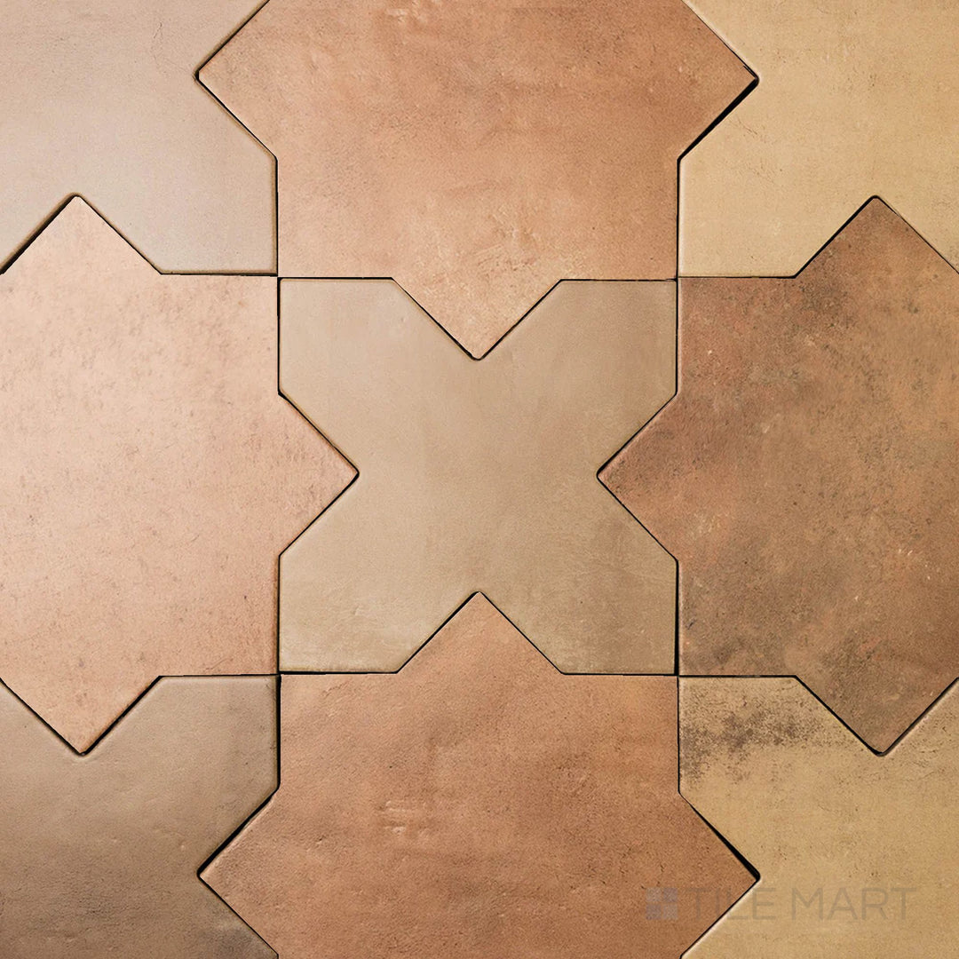 Warm earth-toned 7x7 matte porcelain tile blending mud cross shapes with rich terracotta star accents