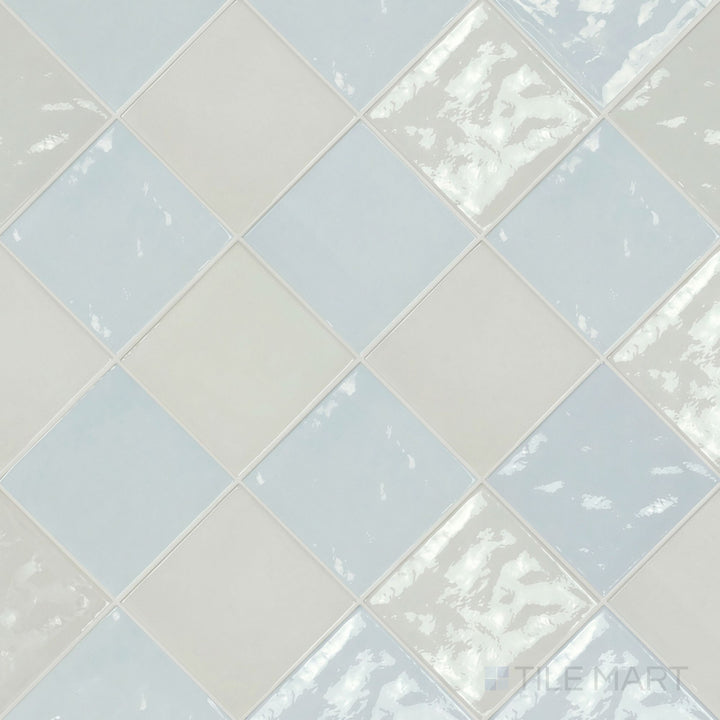 Overview of Village 5x5 white and cloud checkerboard glossy ceramic tile from an alternate angle highlighting its vibrant two-tone contrast and glossy finish