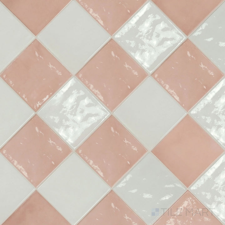 Overview of Village 5x5 white and rose gold checkerboard glossy ceramic tile from an alternate angle highlighting its vibrant two-tone contrast and glossy finish