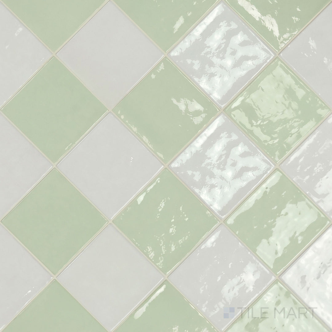 Overview of Village 5x5 white and mint checkerboard glossy ceramic tile from an alternate angle highlighting its vibrant two-tone contrast and glossy finish