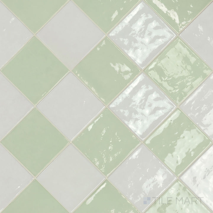 Overview of Village 5x5 white and mint checkerboard glossy ceramic tile from an alternate angle highlighting its vibrant two-tone contrast and glossy finish