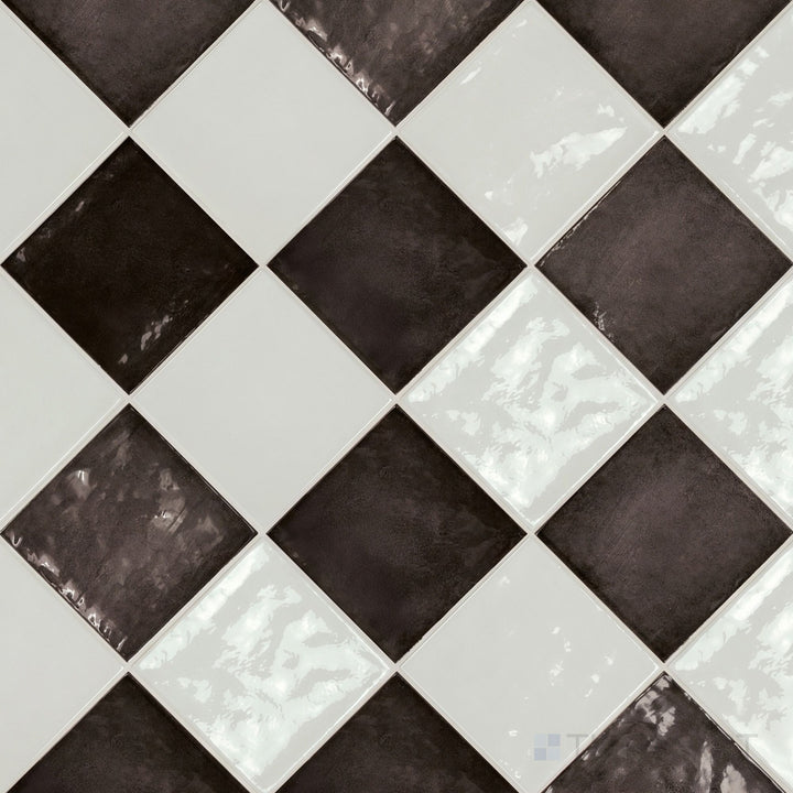 Overview of Village 5x5 white and black checkerboard glossy ceramic tile from an alternate angle highlighting its vibrant two-tone contrast and glossy finish