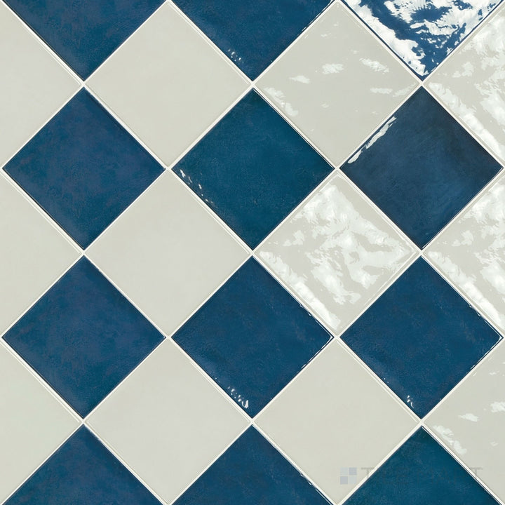 Overview of Village 5x5 white and royal blue checkerboard glossy ceramic tile from an alternate angle highlighting its vibrant two-tone contrast and glossy finish