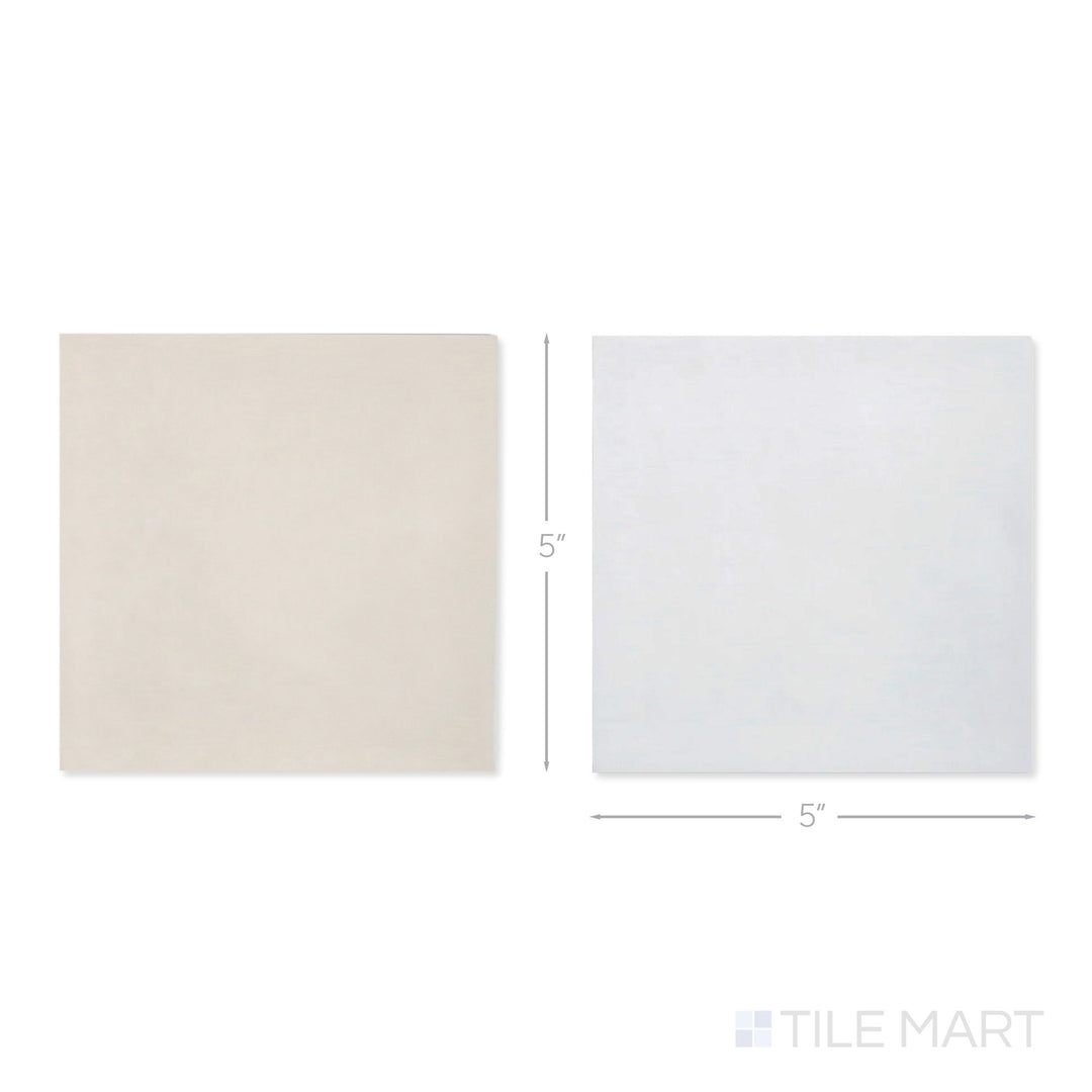 Top-down view of a single Village 5x5 white and mushroom checkerboard glossy ceramic tile showing its light-reflective surface and two-tone finish detail