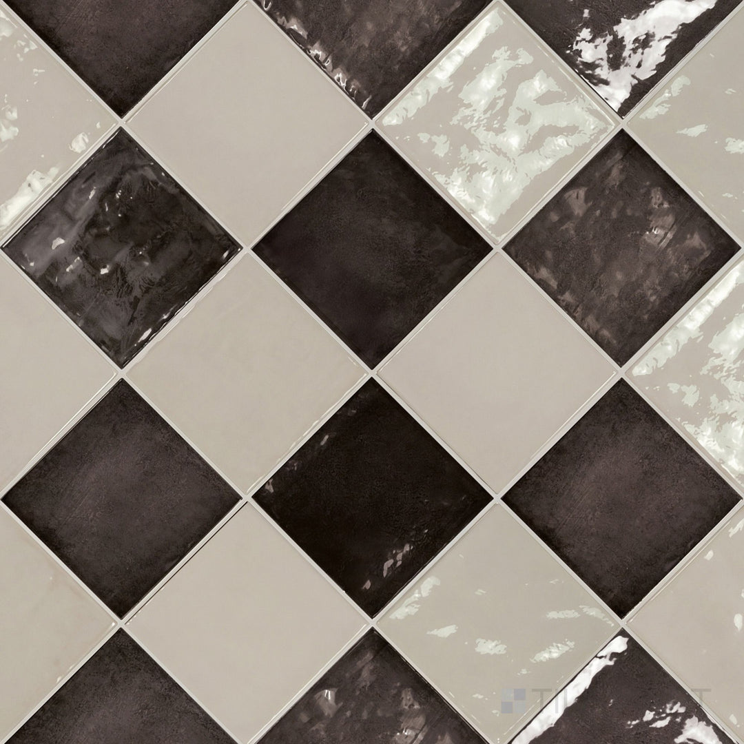 Overview of Village 5x5 silver mist and black checkerboard glossy ceramic tile from an alternate angle highlighting its vibrant two-tone contrast and glossy finish