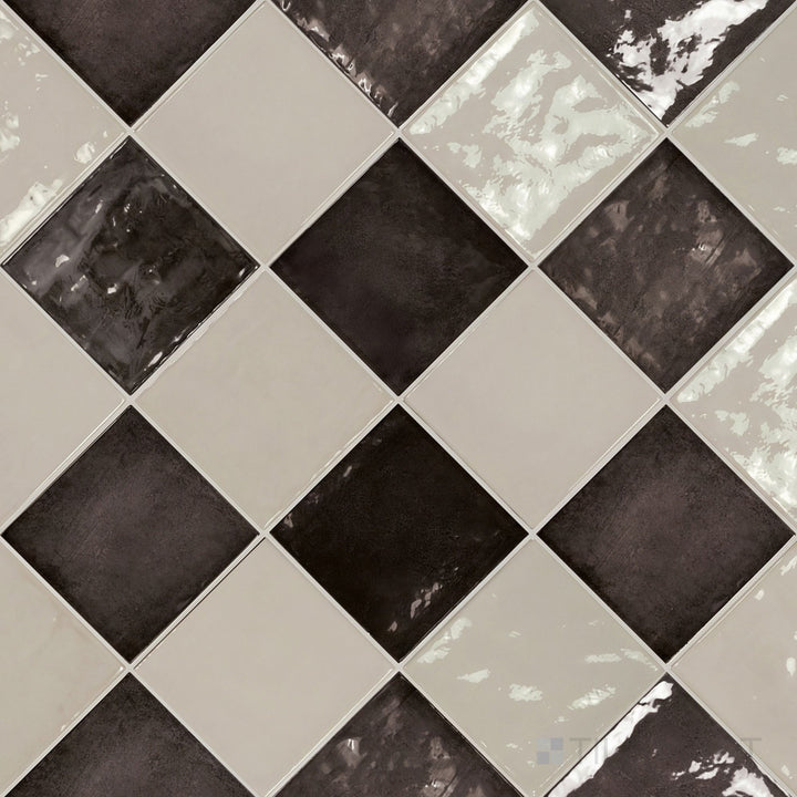 Overview of Village 5x5 silver mist and black checkerboard glossy ceramic tile from an alternate angle highlighting its vibrant two-tone contrast and glossy finish