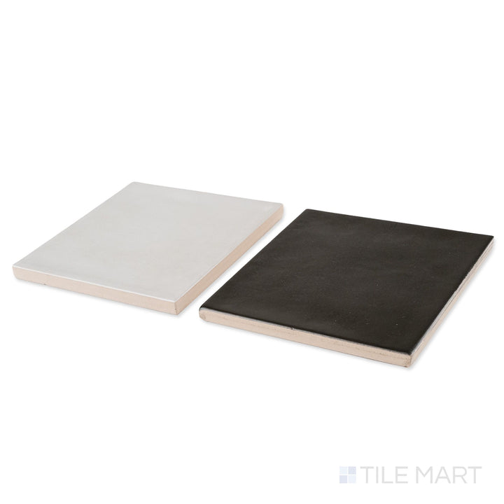 Corner shot of Village 5x5 silver mist and black checkerboard glossy ceramic tile revealing its edge profile and glossy silver mist and black surface
