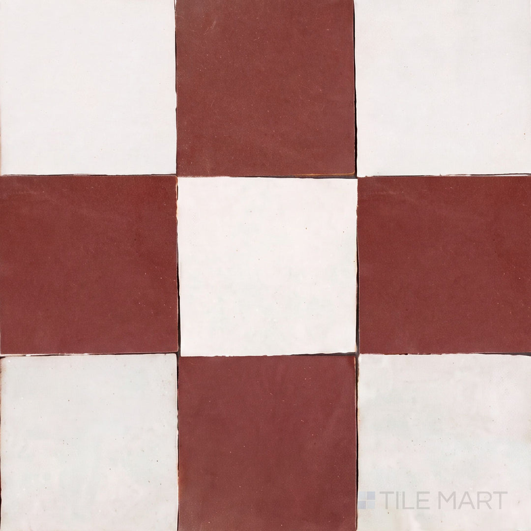 Overview of Zellige Classique 4x4 checkerboard in Atlas White and Al Hamra, showing its hand cut glaze variation.