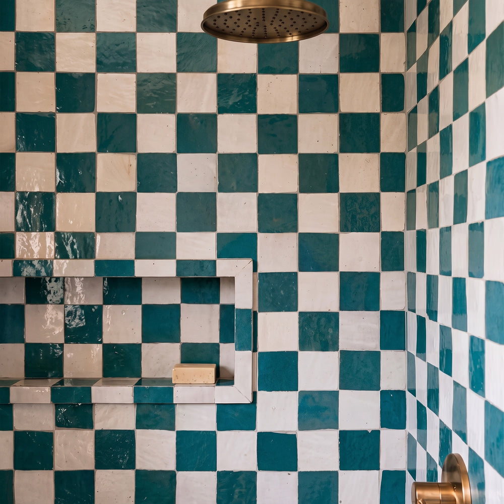 Zellige Classique in Atlas White and Blue City brings artisan glaze variation and vibrant color to a checkerboard wall.