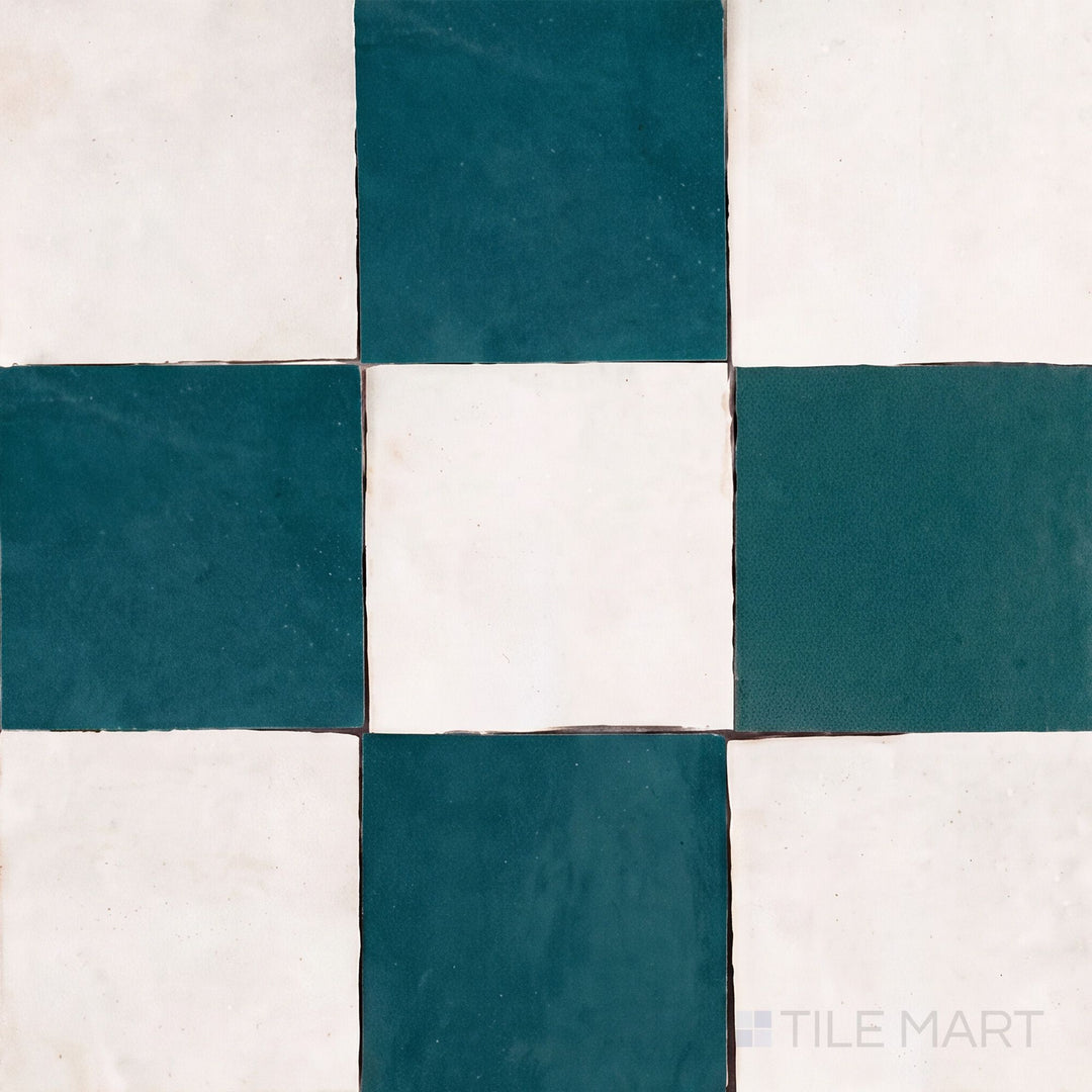Overview of Zellige Classique 4x4 checkerboard in Atlas White and Blue City, showing its hand cut glaze variation.