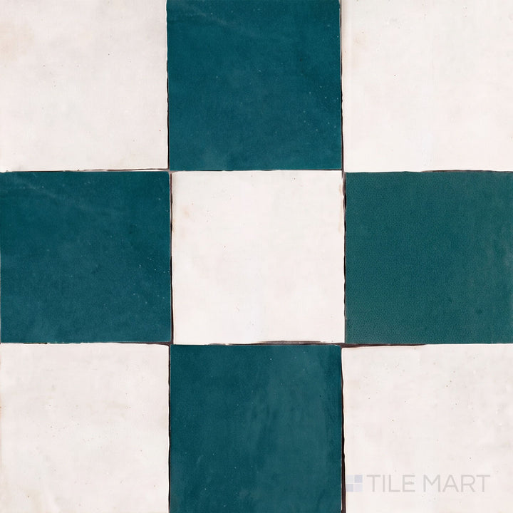 Overview of Zellige Classique 4x4 checkerboard in Atlas White and Blue City, showing its hand cut glaze variation.