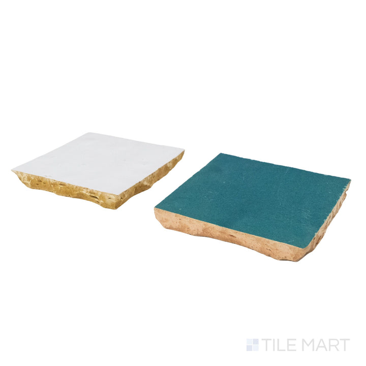 Angled view of Zellige Classique tile in Atlas White and Blue City, revealing its hand cut edge and light-catching glaze.
