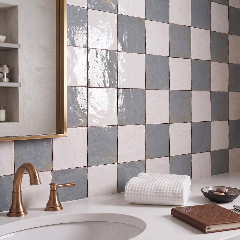 Zellige Classique in Atlas White and Gris Perle brings artisan glaze variation and vibrant color to a checkerboard wall.