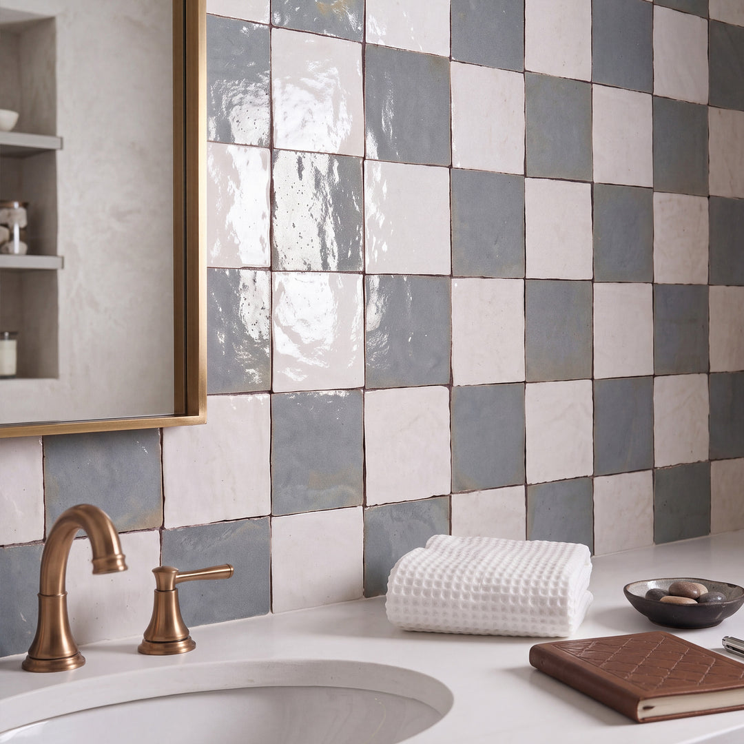Zellige Classique in Atlas White and Gris Perle brings artisan glaze variation and vibrant color to a checkerboard wall.