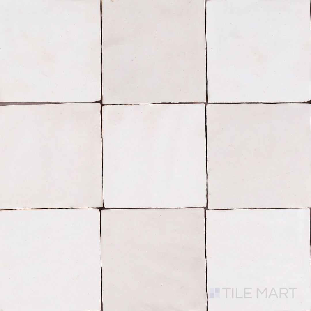 Overview of Zellige Classique 4x4 checkerboard in Atlas White and Lambswool, showing its hand cut glaze variation.