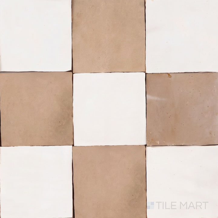Overview of Zellige Classique 4x4 checkerboard in Atlas White and Sahara Rose, showing its hand cut glaze variation.