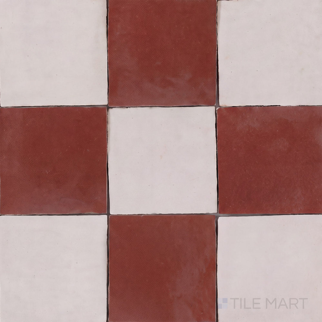 Overview of Zellige Classique 4x4 checkerboard in Lambswool and Al Hamra, showing its hand cut glaze variation.