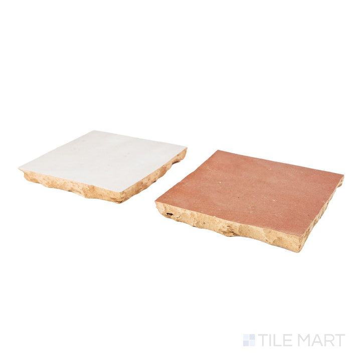 Angled view of Zellige Classique tile in Lambswool and Al Hamra, revealing its hand cut edge and light-catching glaze.