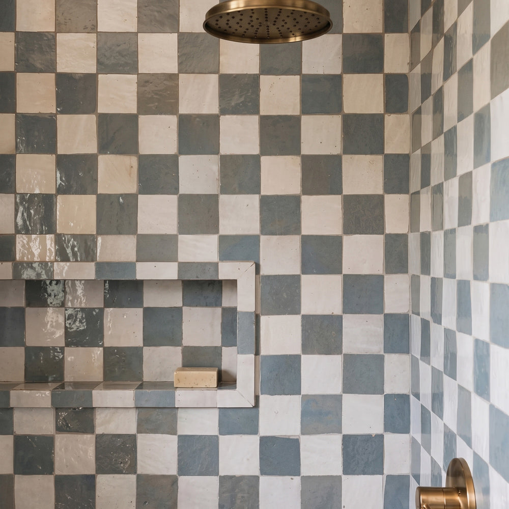 Zellige Classique in Lambswool and Gris Perle brings artisan glaze variation and vibrant color to a checkerboard wall.