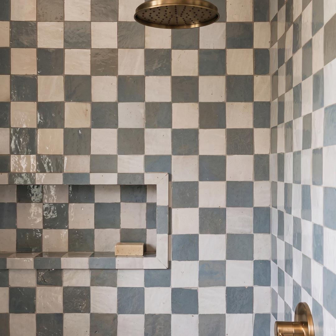 Zellige Classique in Lambswool and Gris Perle brings artisan glaze variation and vibrant color to a checkerboard wall.