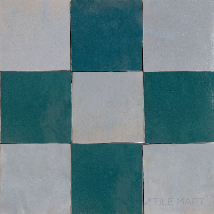 Overview of Zellige Classique 4x4 checkerboard in Gris Perle and Blue City, showing its hand cut glaze variation.
