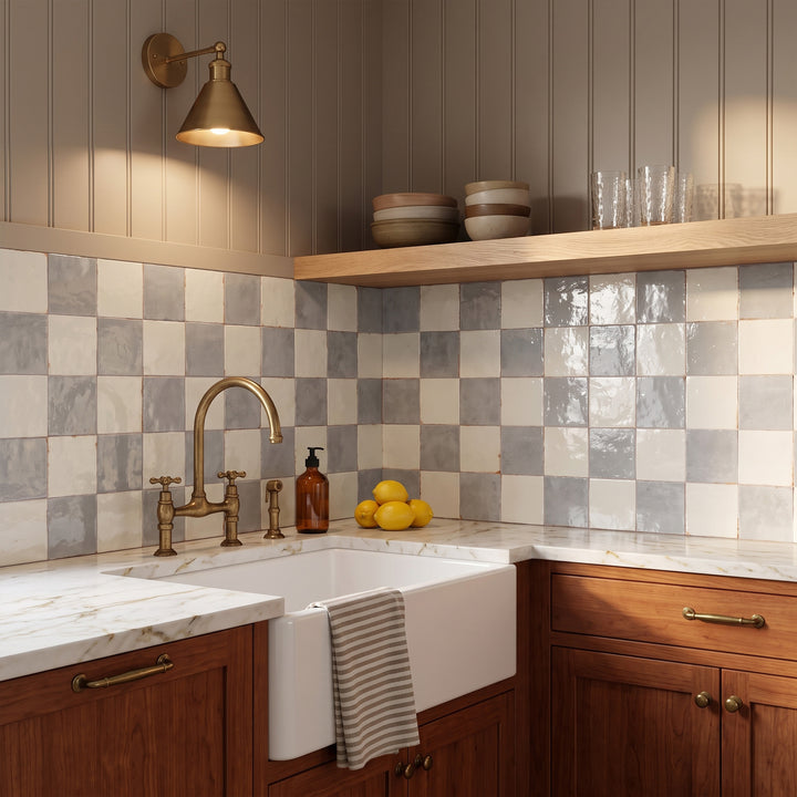 The bright glaze gives Agadir in Niebla and Piedra a vivid, light-catching color depth underfoot.