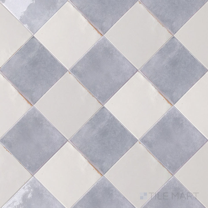 Alternate overview of Agadir checkerboard in Niebla and Piedra, highlighting its bright porcelain finish.