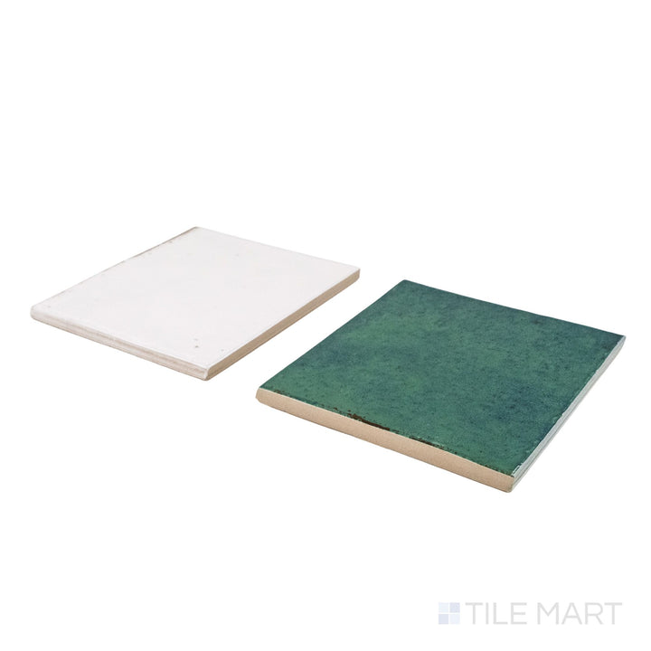 Angled view of Agadir tile in Niebla and Selva, revealing its edge profile and vibrant porcelain finish.