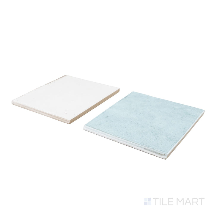 Corner shot of Agadir tile in Niebla and Agua, revealing its edge profile and vibrant porcelain finish.