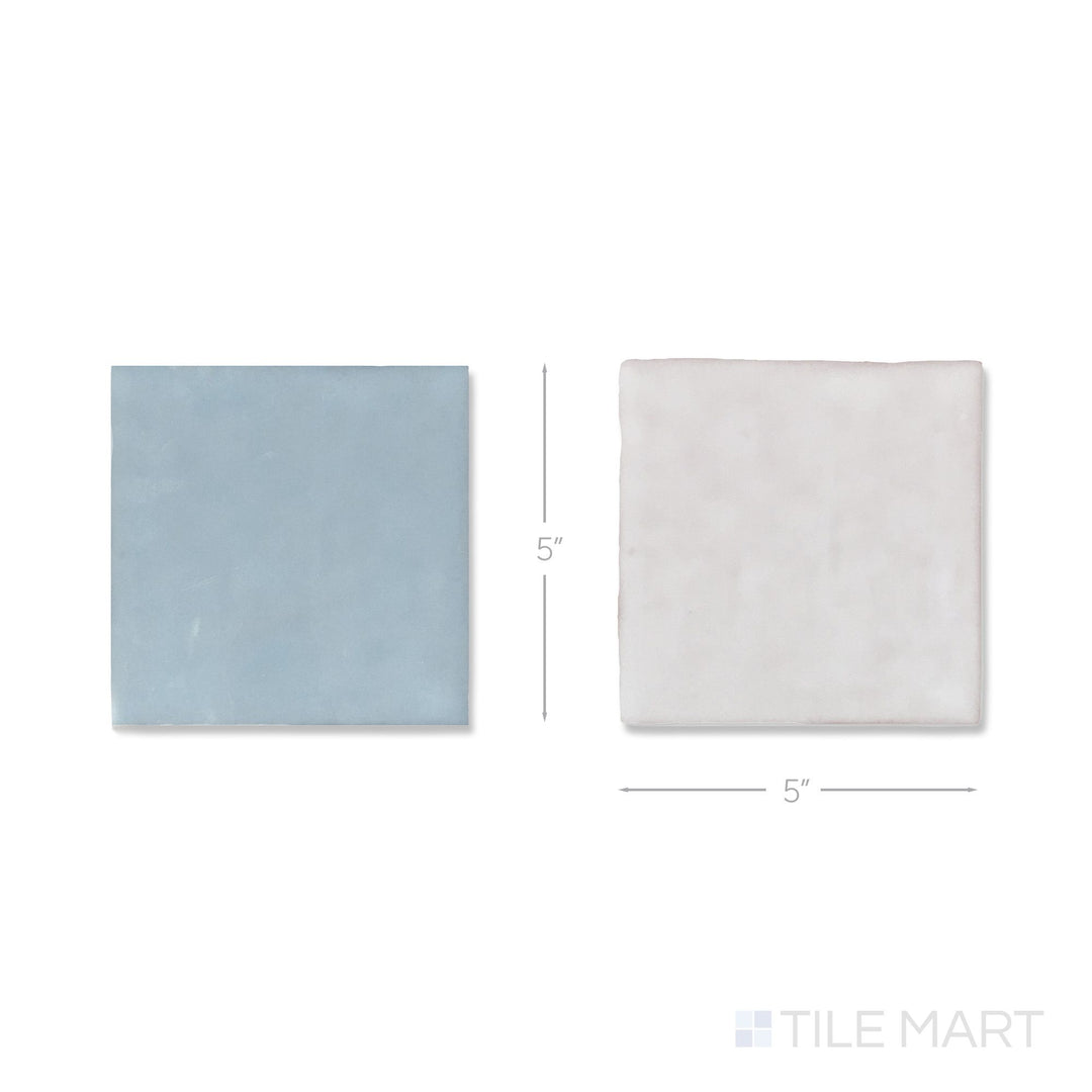 Flat lay of a single Melody tile in Easton White and Lyric Blue, showing the glossy ceramic finish up close.